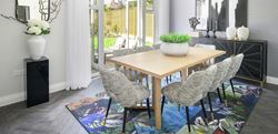 Dining area with grey design and double doors leading to the garden