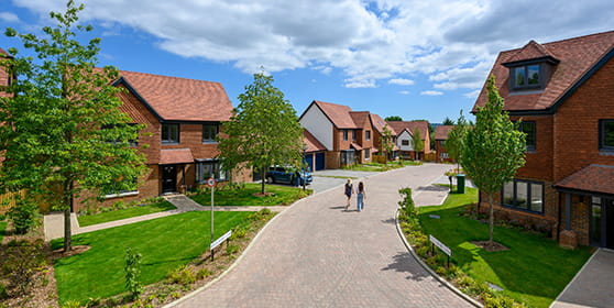 An exterior street scene image of Oakhill on a warm sunny day