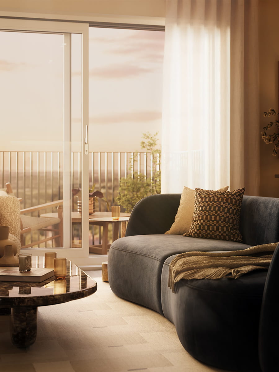 Modern designed living space with sofa and coffee table adjacent to balcony doors