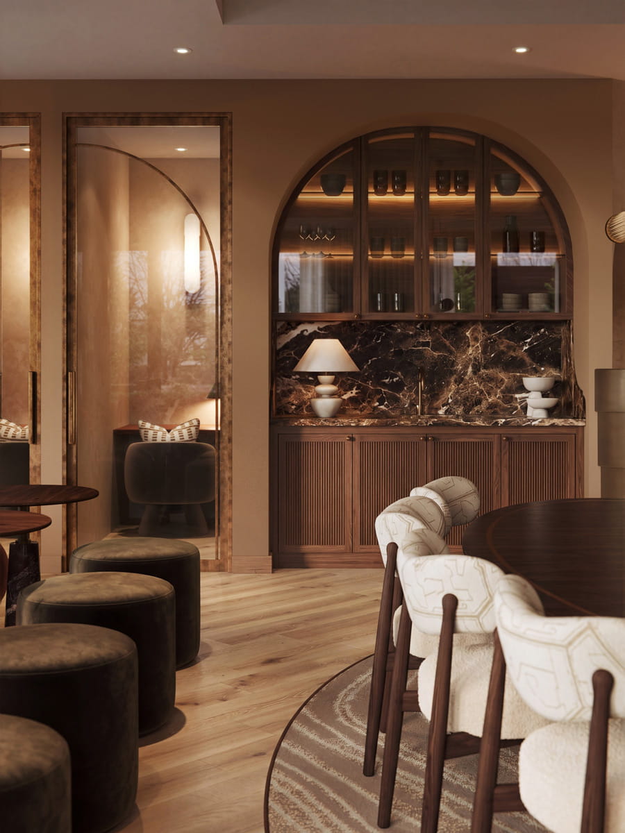 Lounge bar study area, ample seating, warm lighting, decorated in warm colours: browns and reds.
