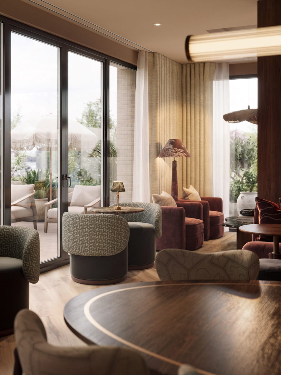 Lounge bar study area, ample seating, warm lighting, decorated in warm colours: browns and reds.
