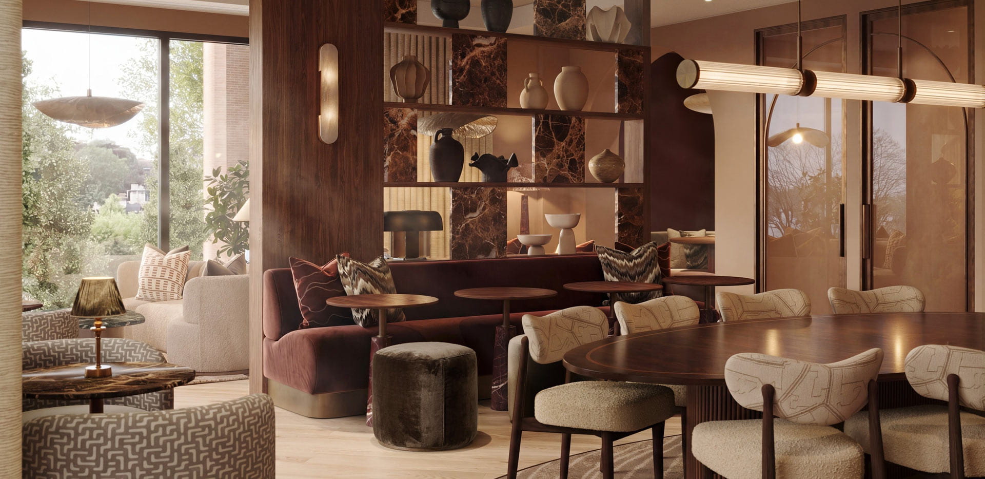 Lounge bar study area, ample seating, warm lighting, decorated in warm colours: browns and reds.