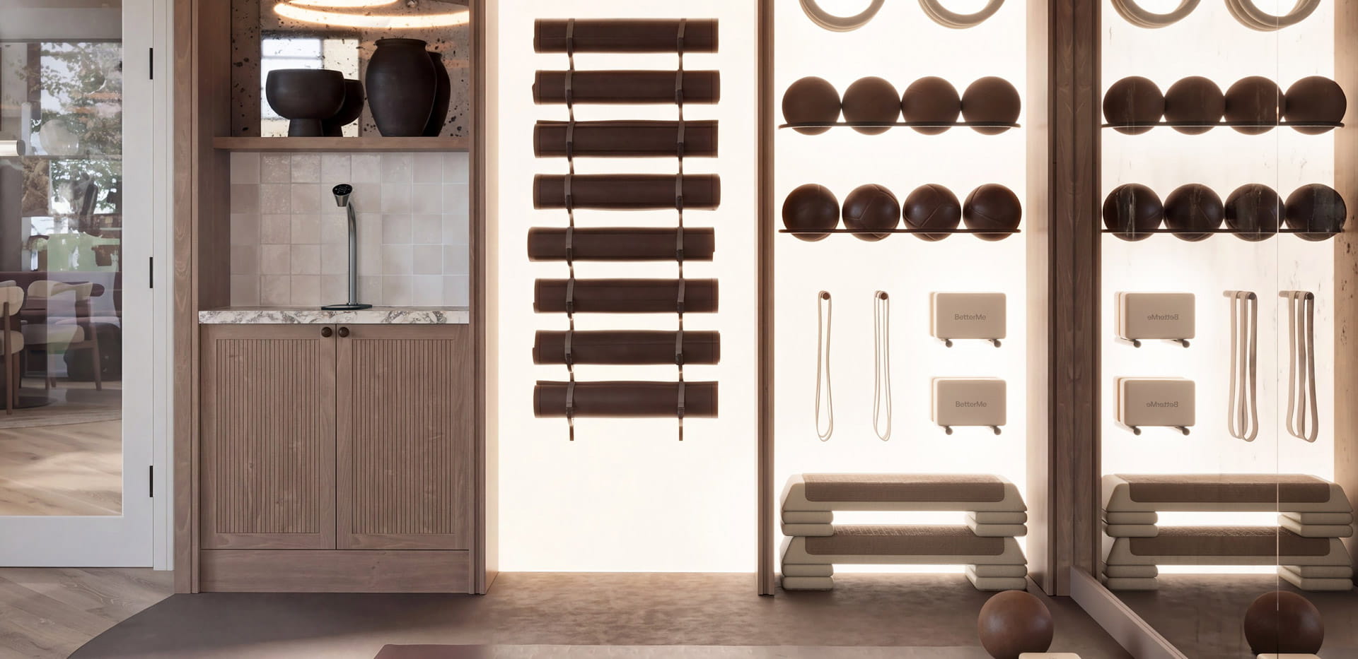 Modern designed gym area with wall containing weights, lifting exercise equipment.