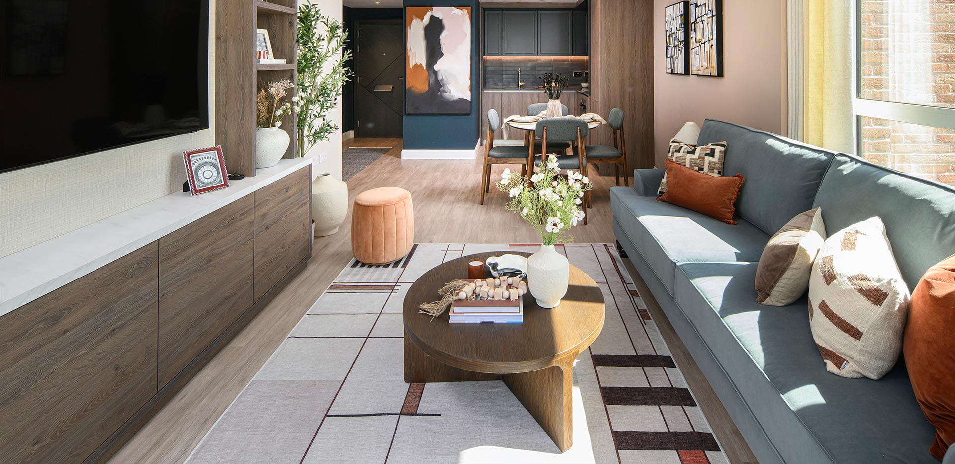 An interior Living / Dining / Kitchen image from the Showhome at The Pinnacle