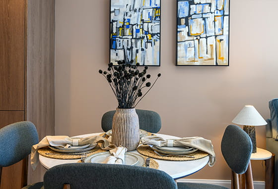 Close shot of a dining table in a Oval Village showhome