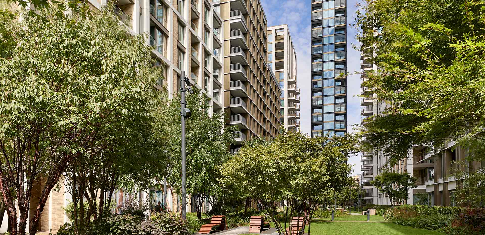 An exterior image of Prince of Wales Drive looking up at the apartment buildings