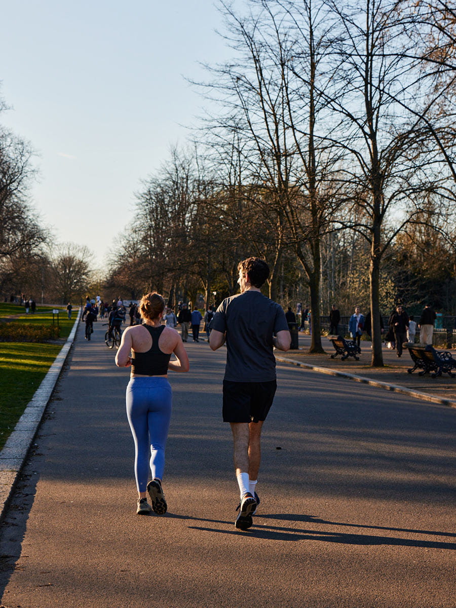 An image of people running in the local park