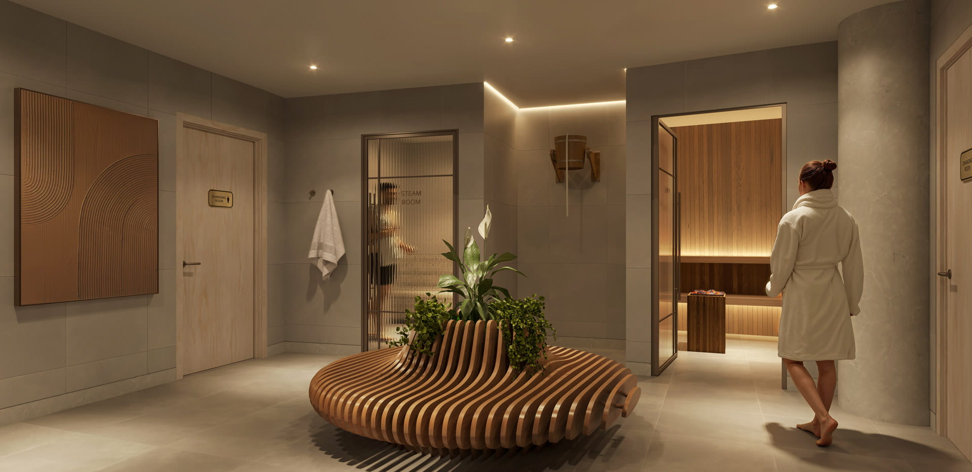 Warmly lit spa lobby with a curved wooden bench, plants, sauna entrance and a woman in a white robe.