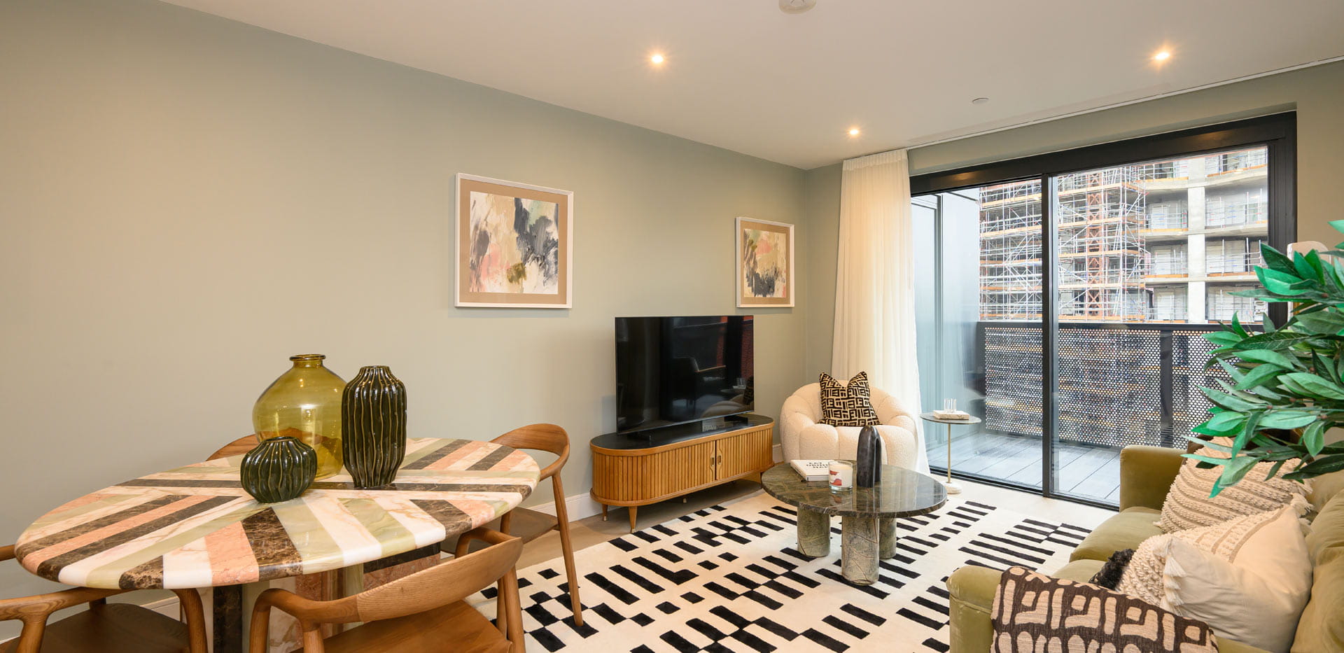 Modern designed and decorated living room dining area.