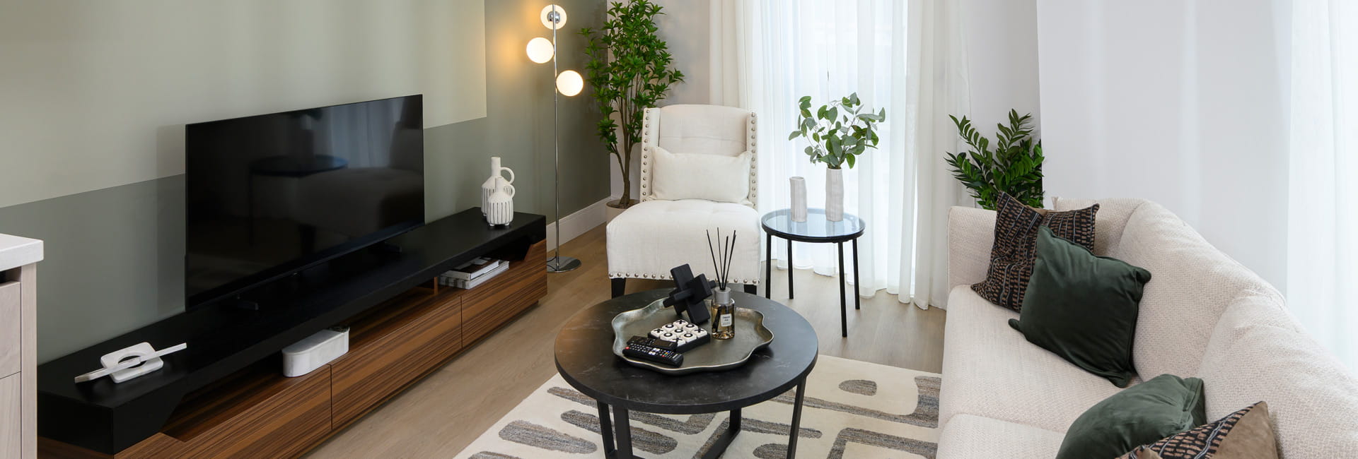 Living space with modern décor, white, grey and black colour palette