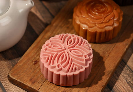 An image of some mooncakes on a board