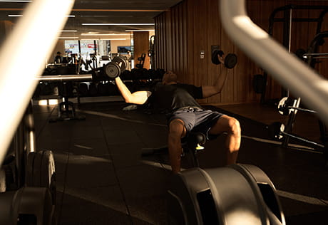 Image of residents working out in a gym