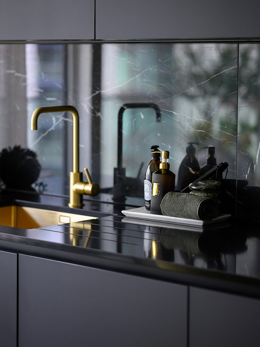 Royal Arsenal Riverside, The Apsley Showhome, high-spec kitchen with dark design