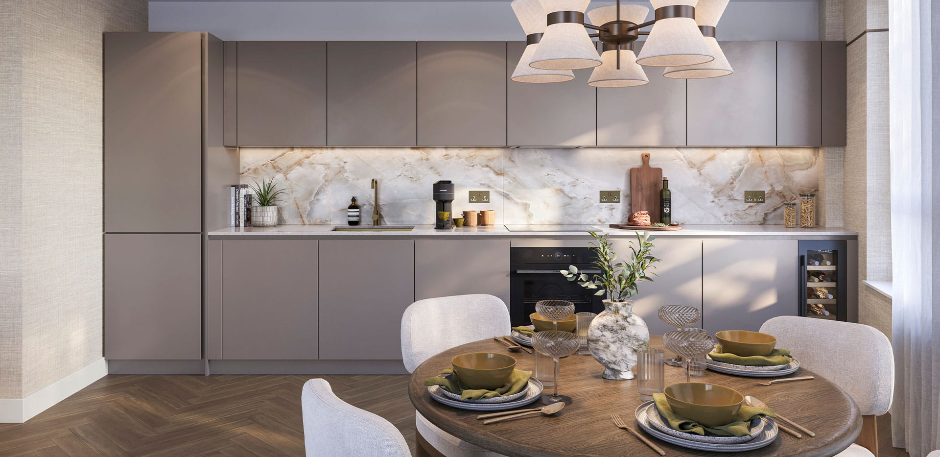 A dark-themed kitchen from a showhome at The Maribor