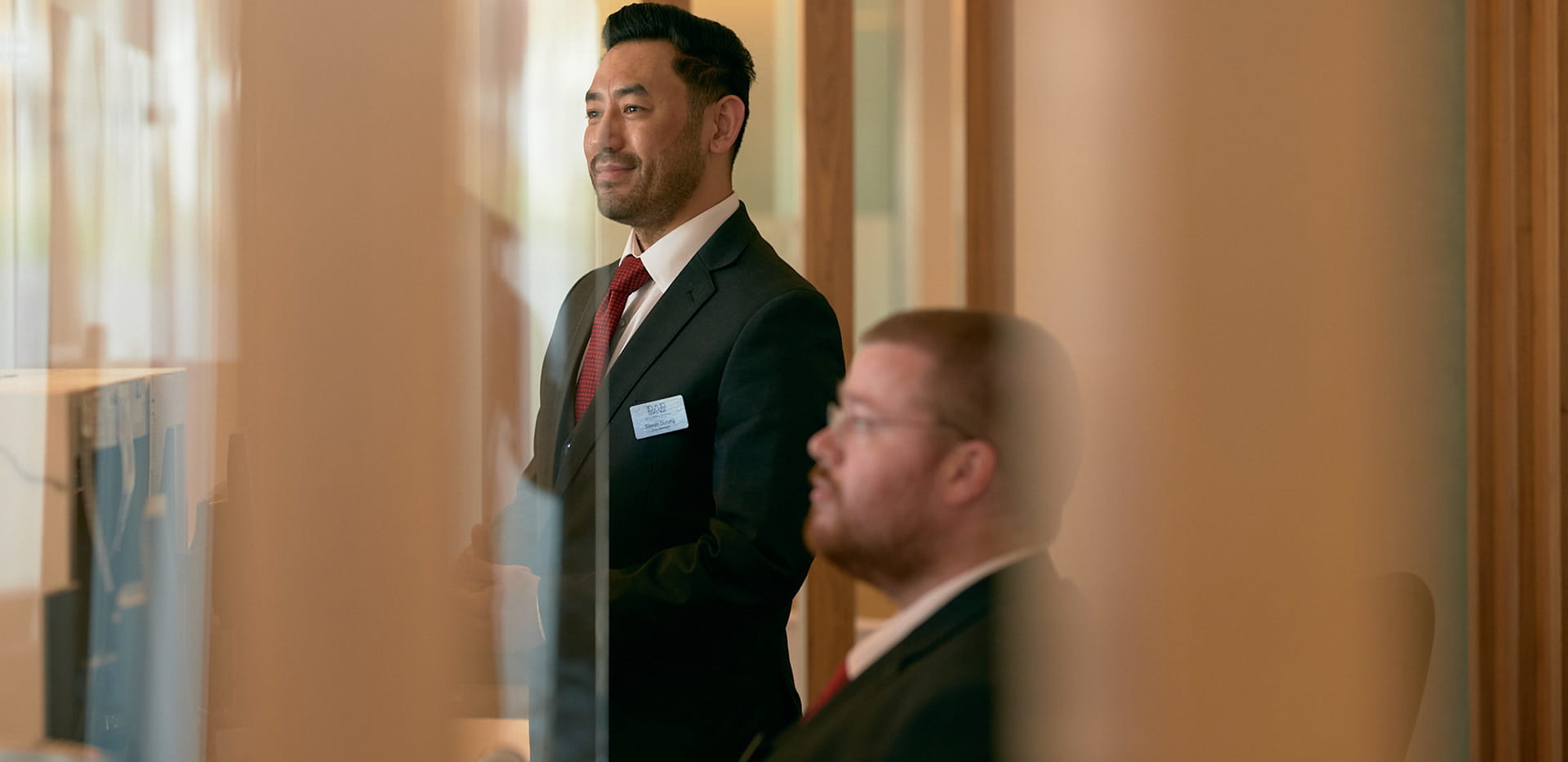 Two male concierge employees