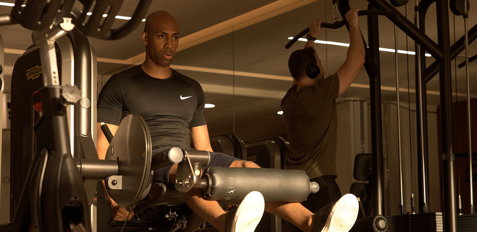 Man lifting weights in the gym