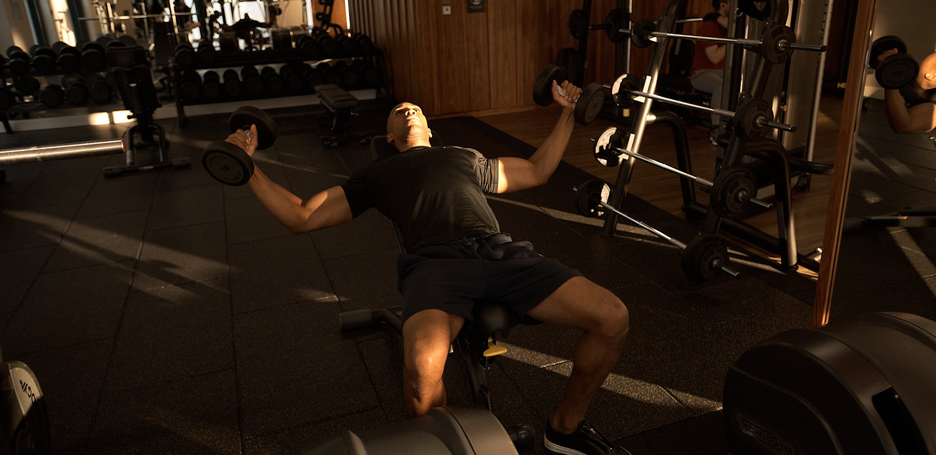 Man lifting weights in the gym