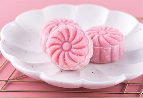 An image of pink mooncakes 