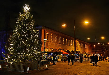 An image of a large christmas tree at Royal Arsenal Riverside