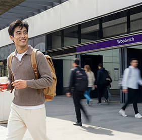 An image of a man at the station at Royal Arsenal Riverside