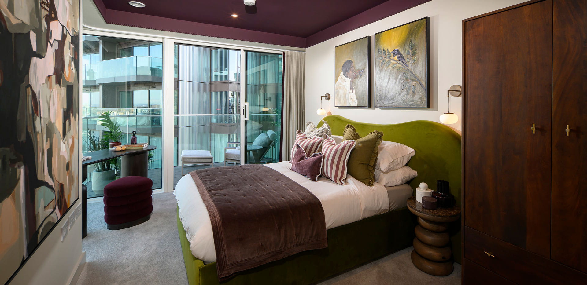 Double bed with modern design décor, floor to ceiling window and vanity table