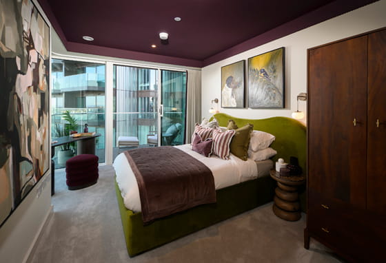 Double bed with modern design décor, floor to ceiling window and vanity table