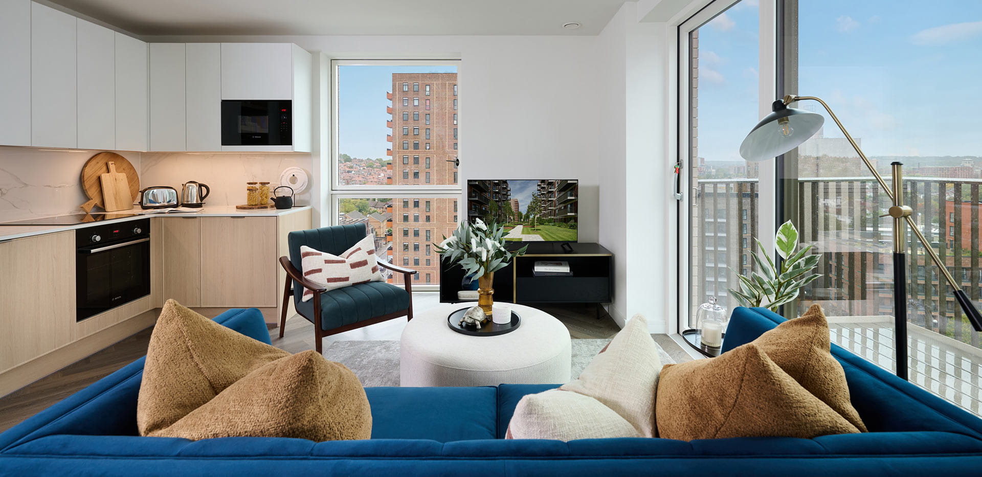 An interior kitchen-living image from a showhome at Bower House
