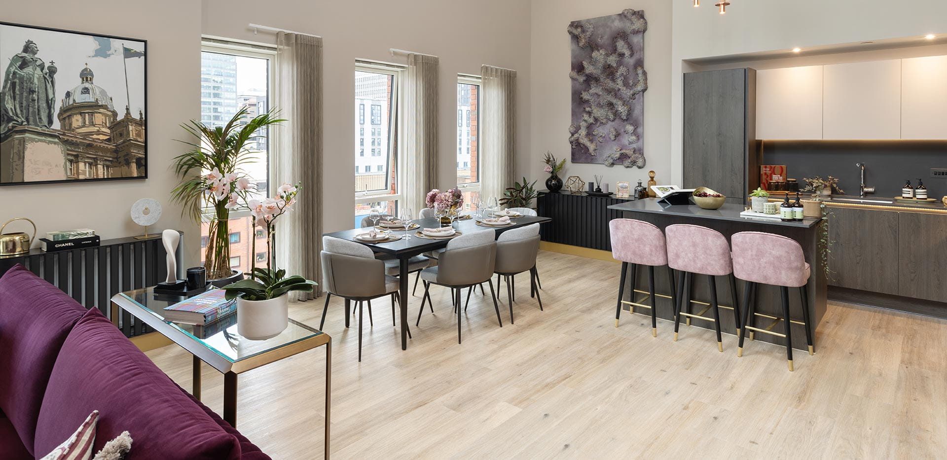 Open dining and kitchen area with neutrally toned décor  