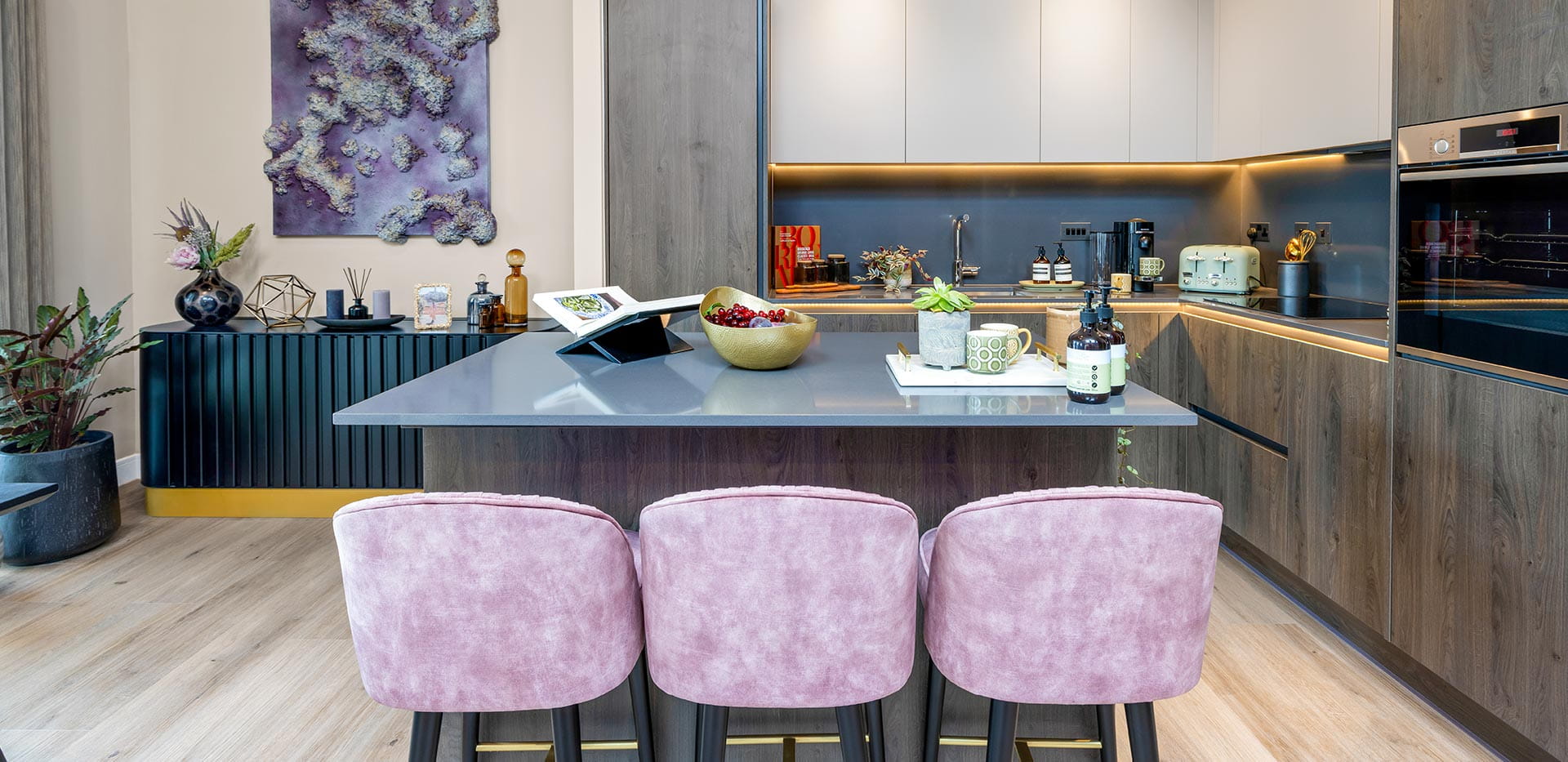 Kitchen area with with island and dark brown design