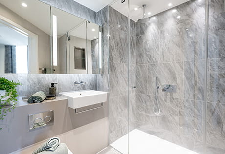South Quay Plaza, showhome bathroom with a light tiled design