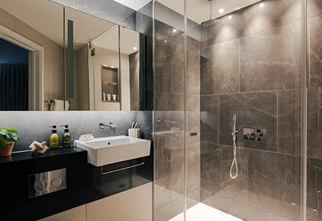 South Quay Plaza, two bedroom home bathroom with a dark design