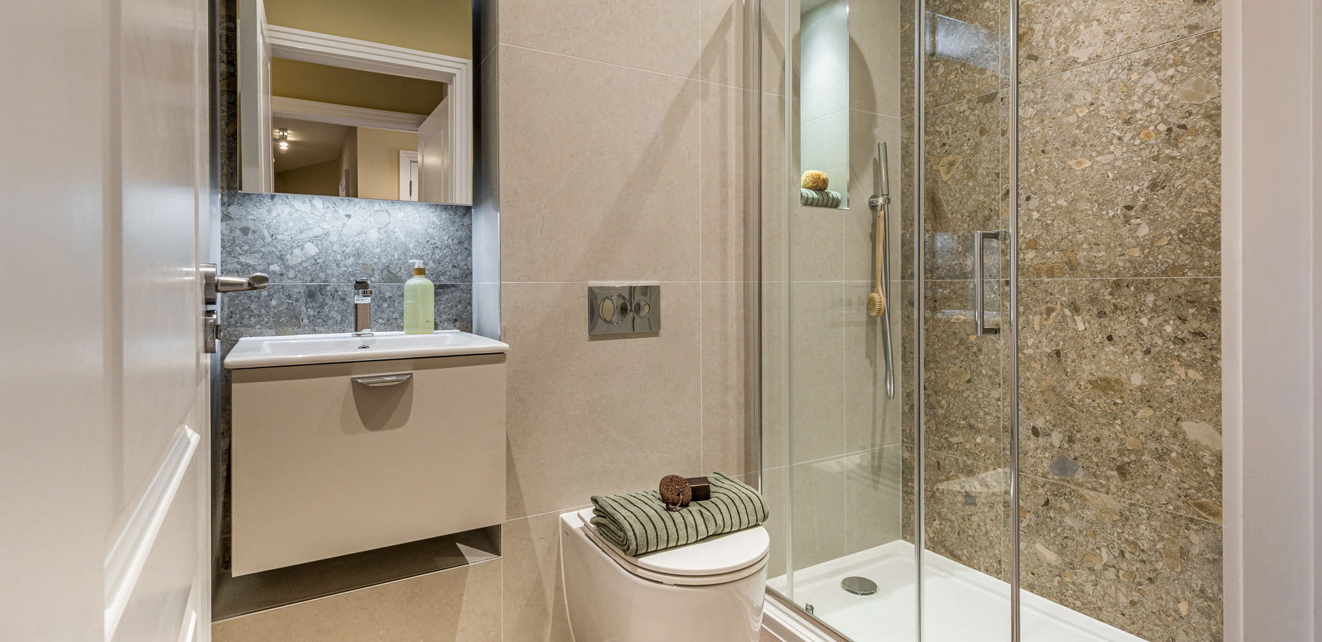 Showeroom with wash basin and toilet