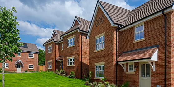 An exterior image of Spring Hill houses with communal gardens