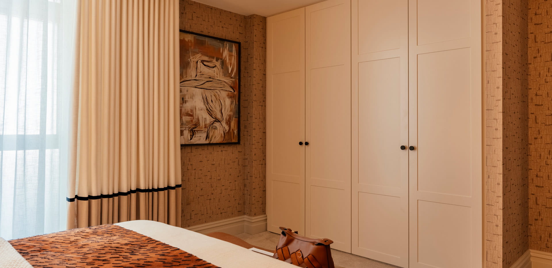 Floor to ceiling windows, ample natural lighting, built-in wardrobes.