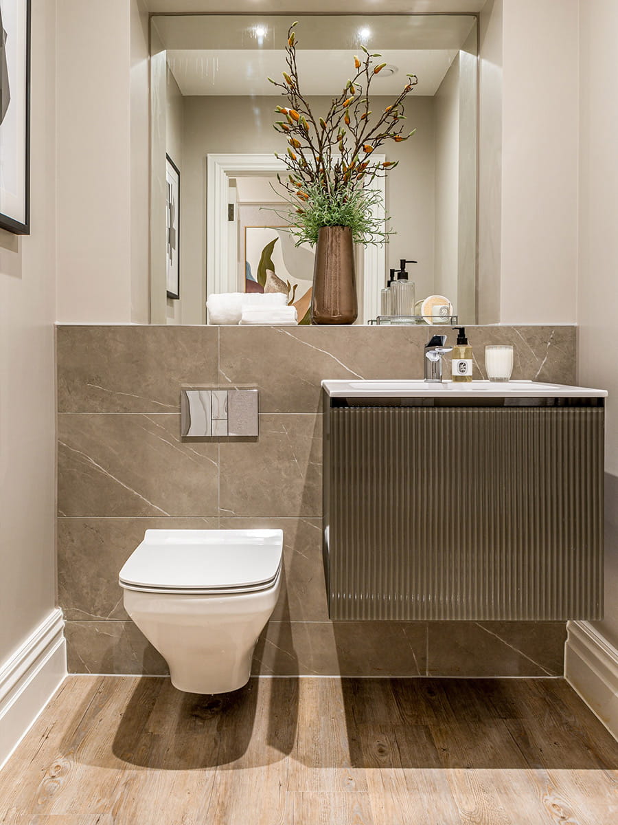 A close up image of the Sink and Toilet at Sunningdale Park