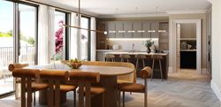 Open kitchen and dining area with full-width glass doors