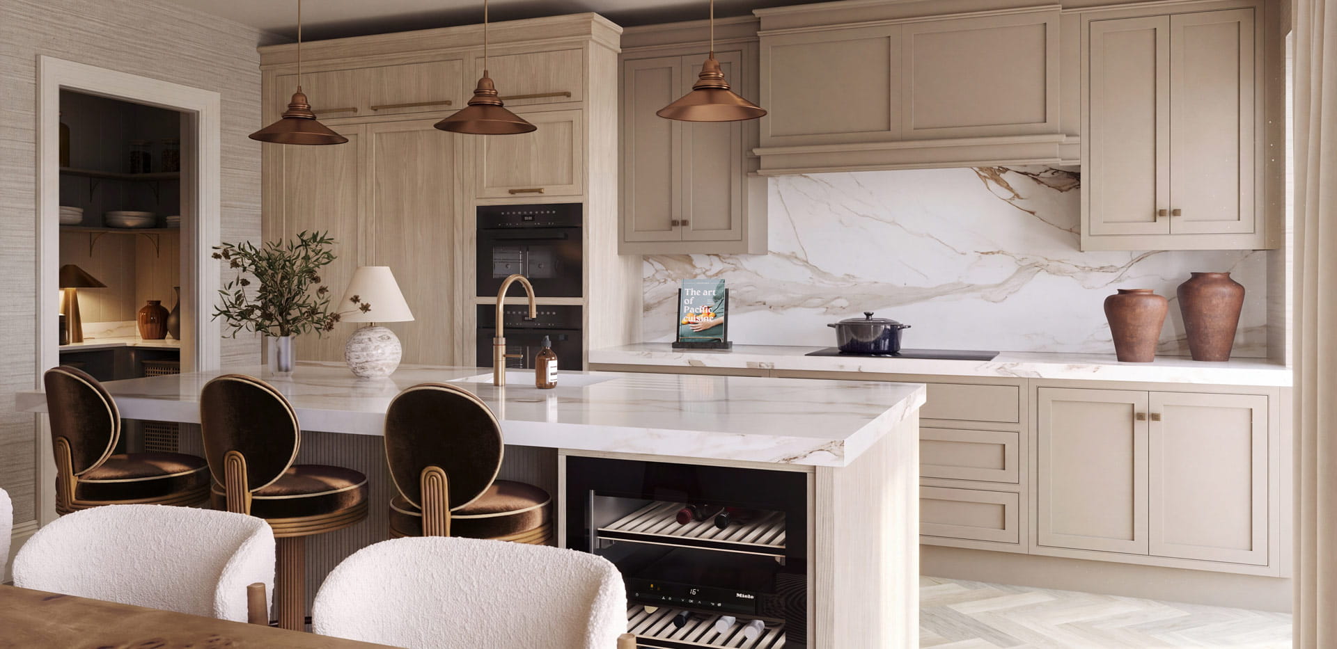 Kitchen with off-white cupboard panels, white counters, breakfast island with wine fridge, dining table in background.