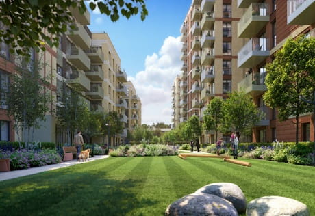 CGI of well maintained grassed lawn in between high rise apartment blocks