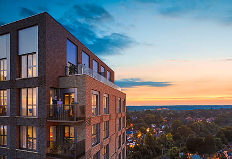 An exterior CGI of Dart House looking over Watford at Dusk