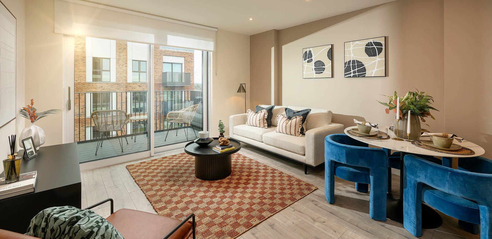 Modern designed and decorated living room dining area and balcony