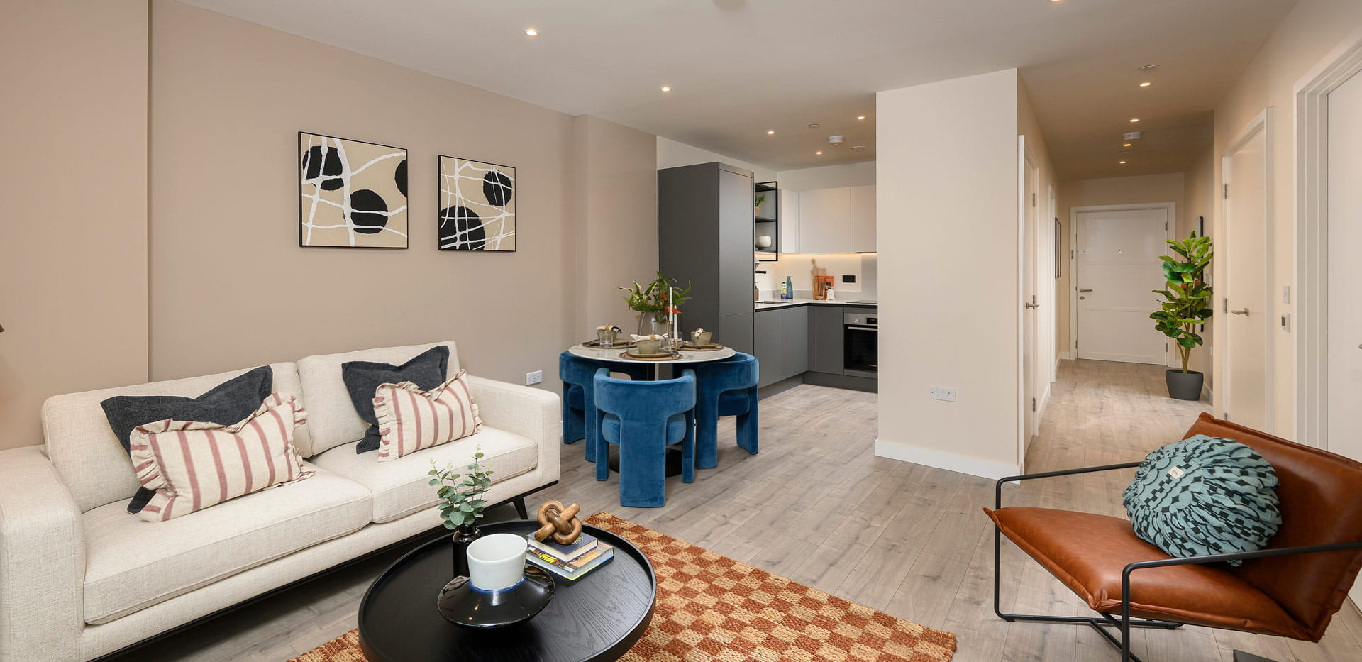 Modern designed and decorated living room dining area with balcony