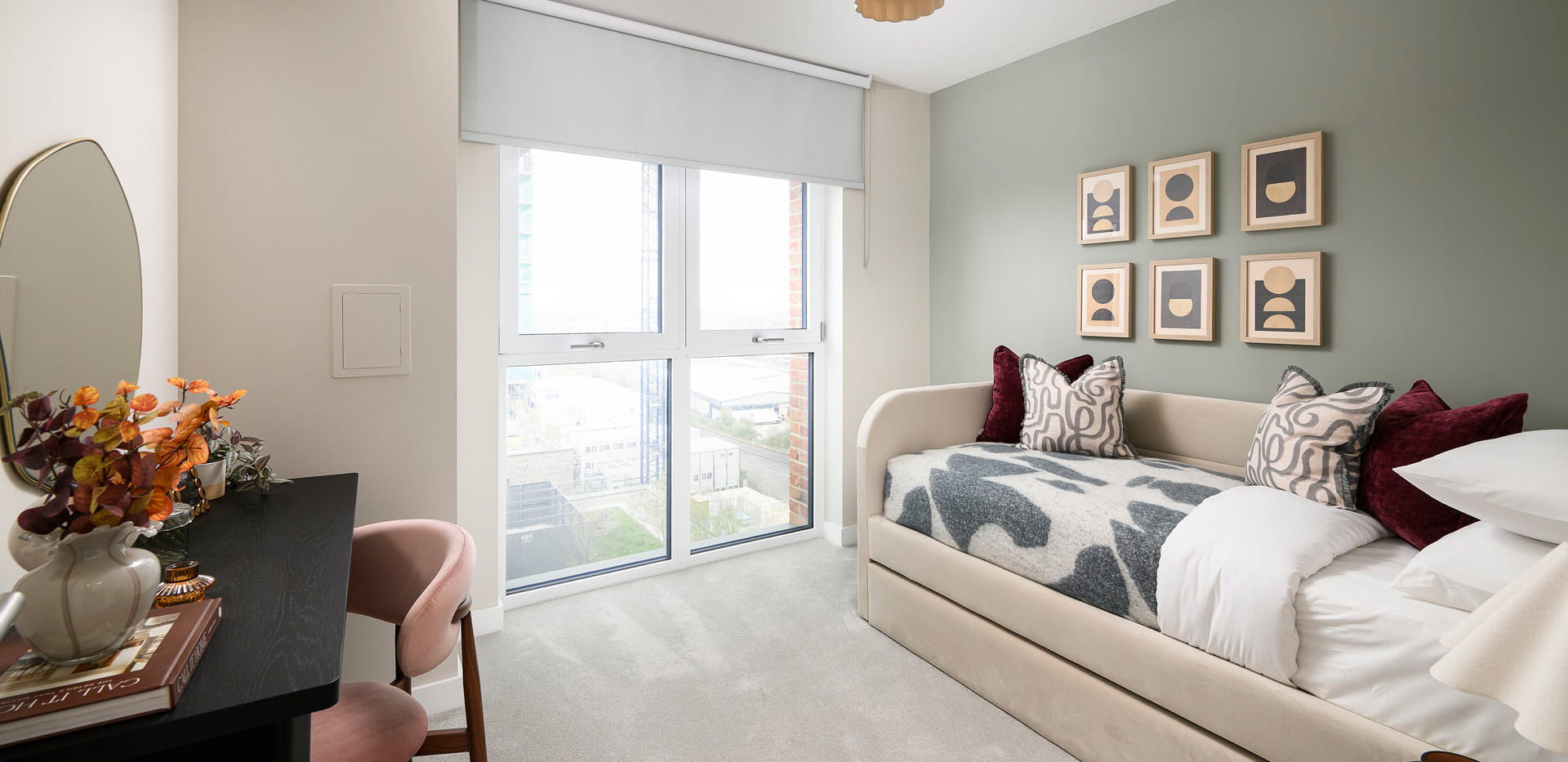 Sofa bed and vanity table, design colour palette is whites and light red