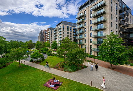 An exterior photograph showing the green space and the buildings at The Green Quarter