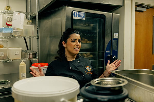 An image of Dipna Anand in the kitchen