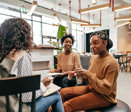 Parkside yards community photo with three women in discussion