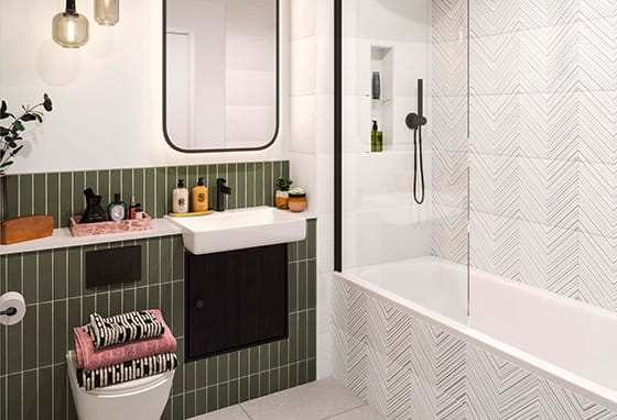 Bathroom with dark green and white textured tiling