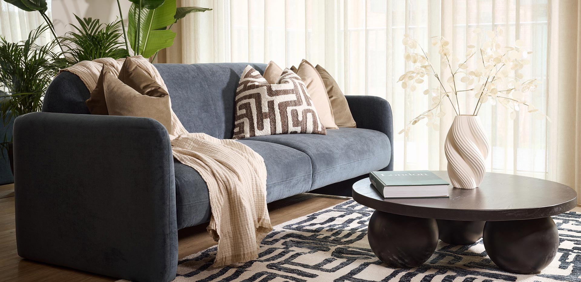 An image of the sofa within the living room of property 297 at Quadrant House