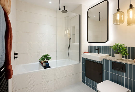 An interior image of a bathroom within Quadrant House, boasting an indigo colour palette