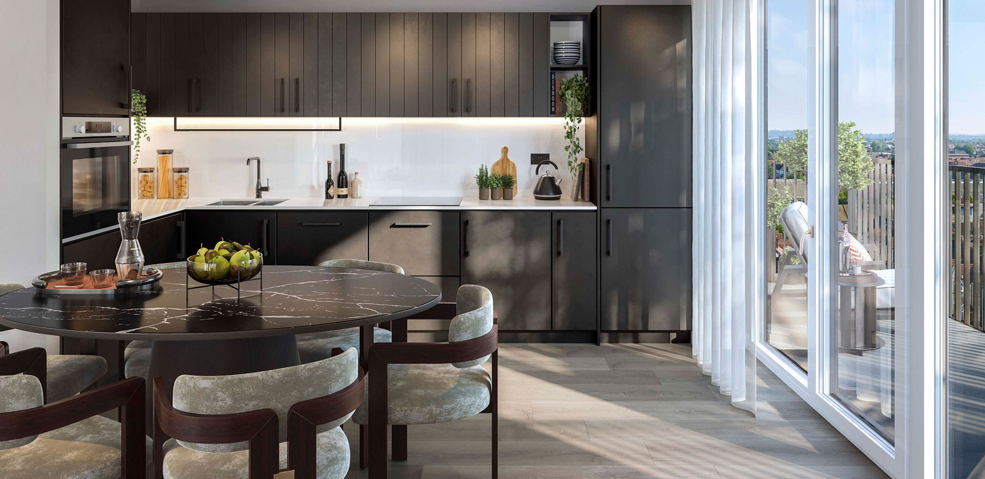 A dark-themed kitchen image from a show apartment at Quarter Yards