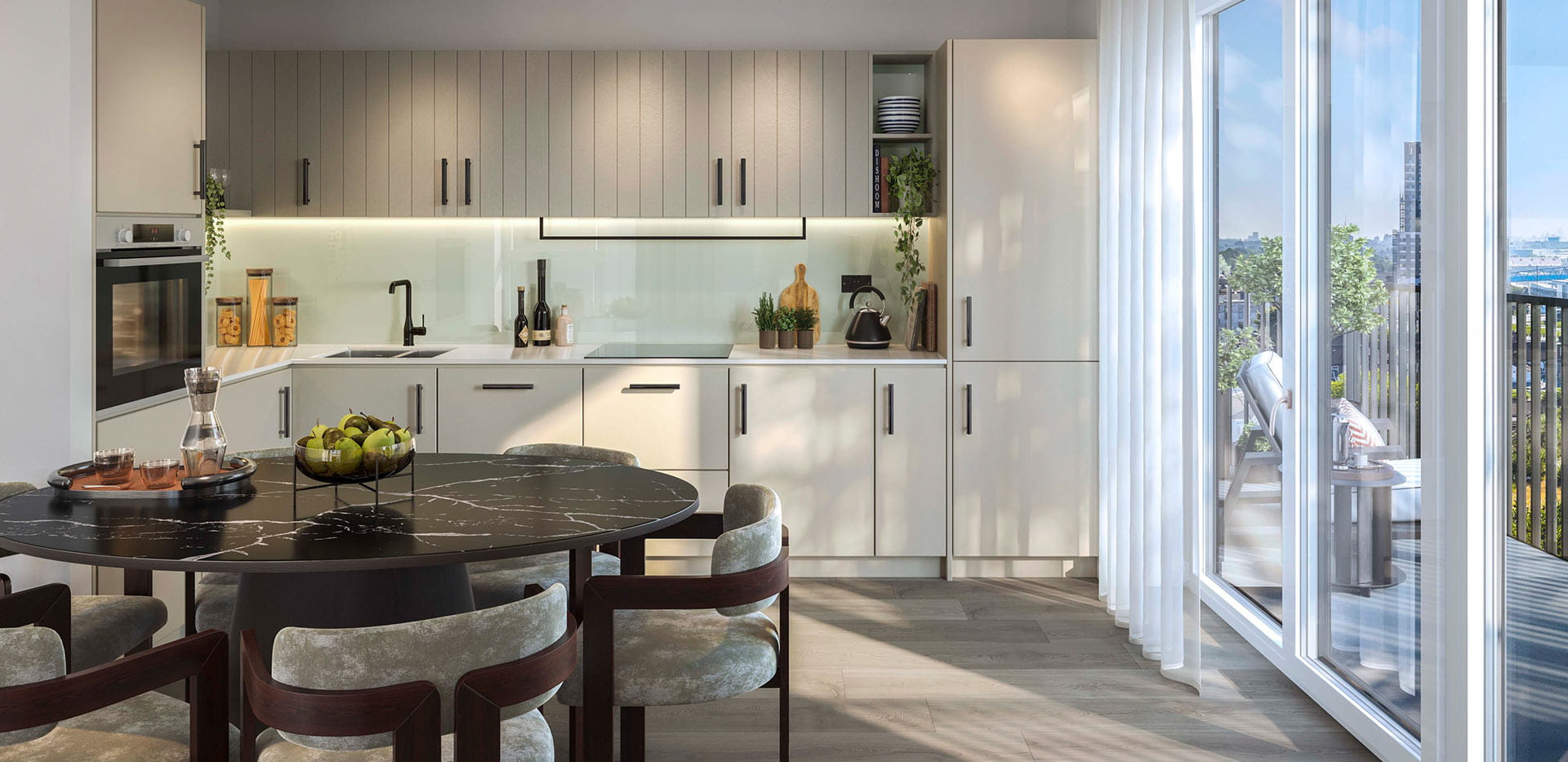 A light-themed kitchen image from a show apartment at Quarter Yards
